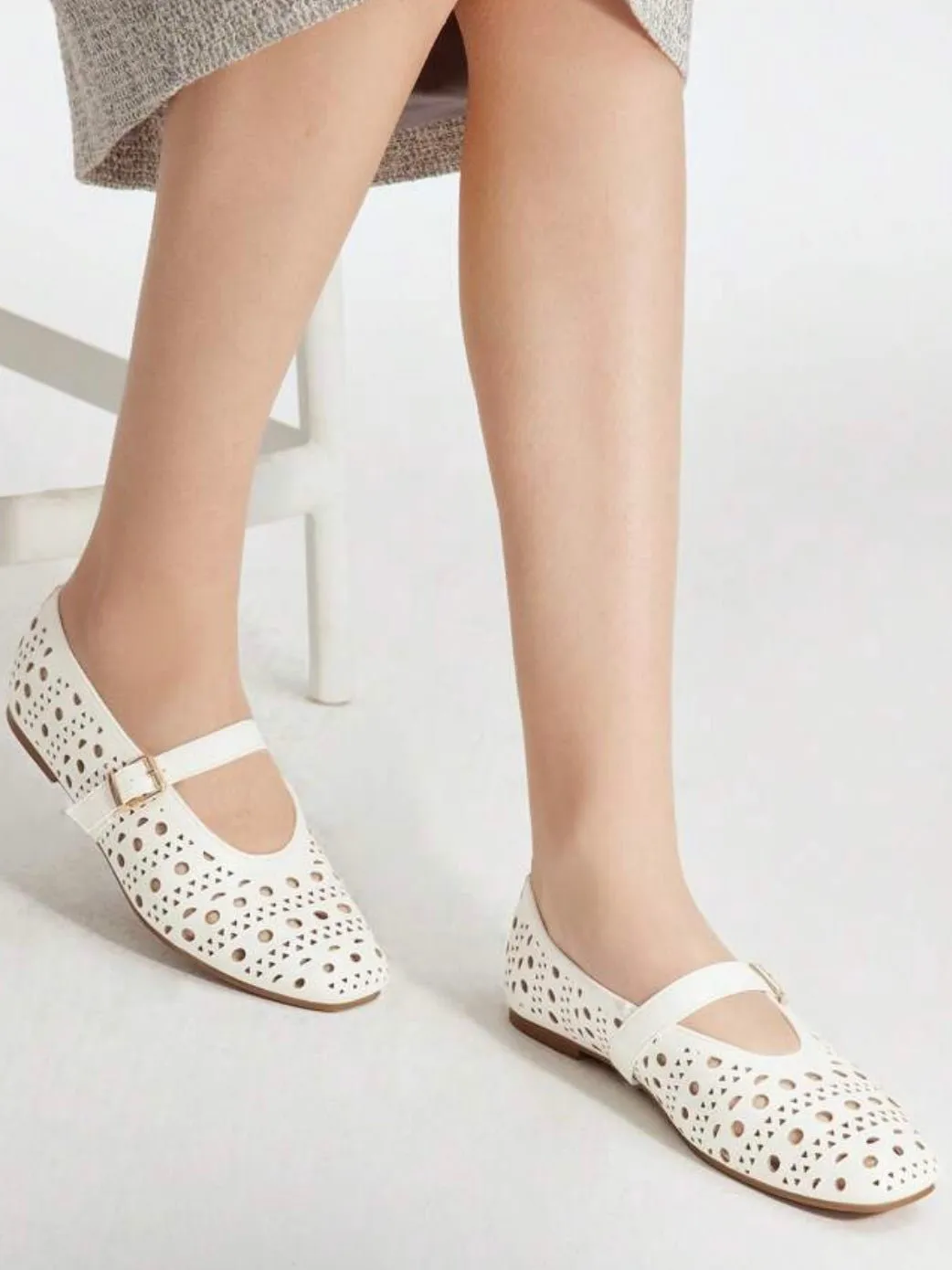 White cutout pattern flats shoes