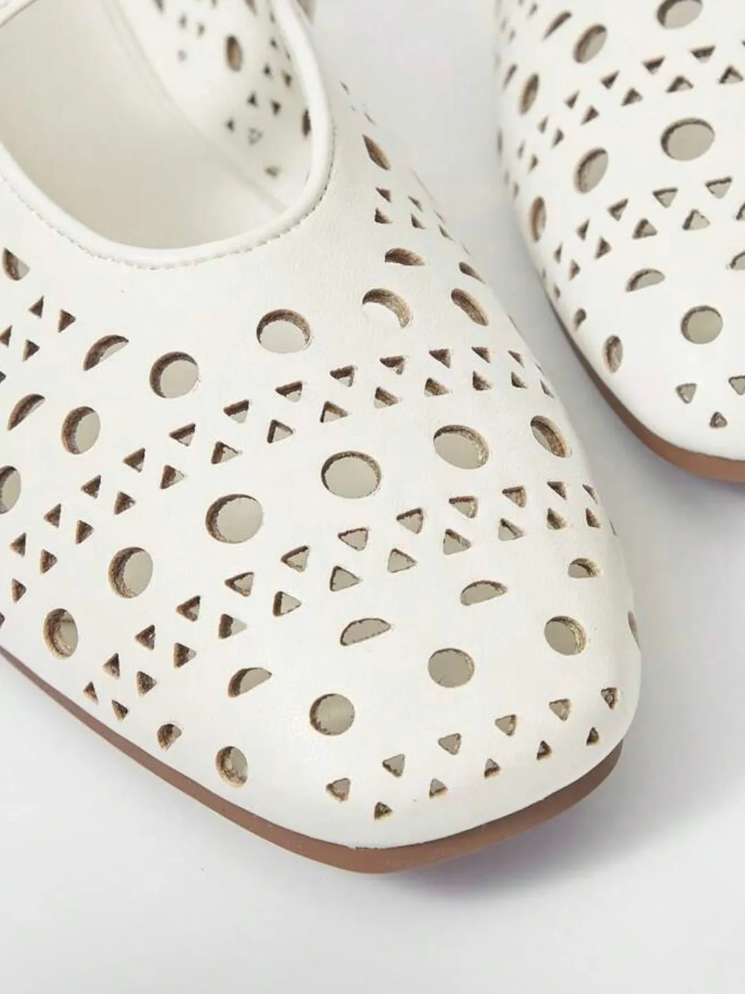 White cutout pattern flats shoes