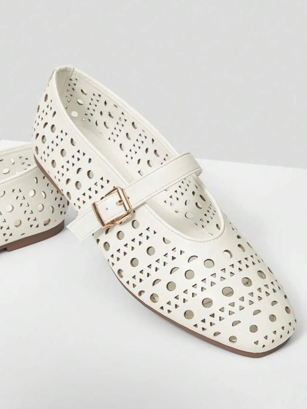 White cutout pattern flats shoes