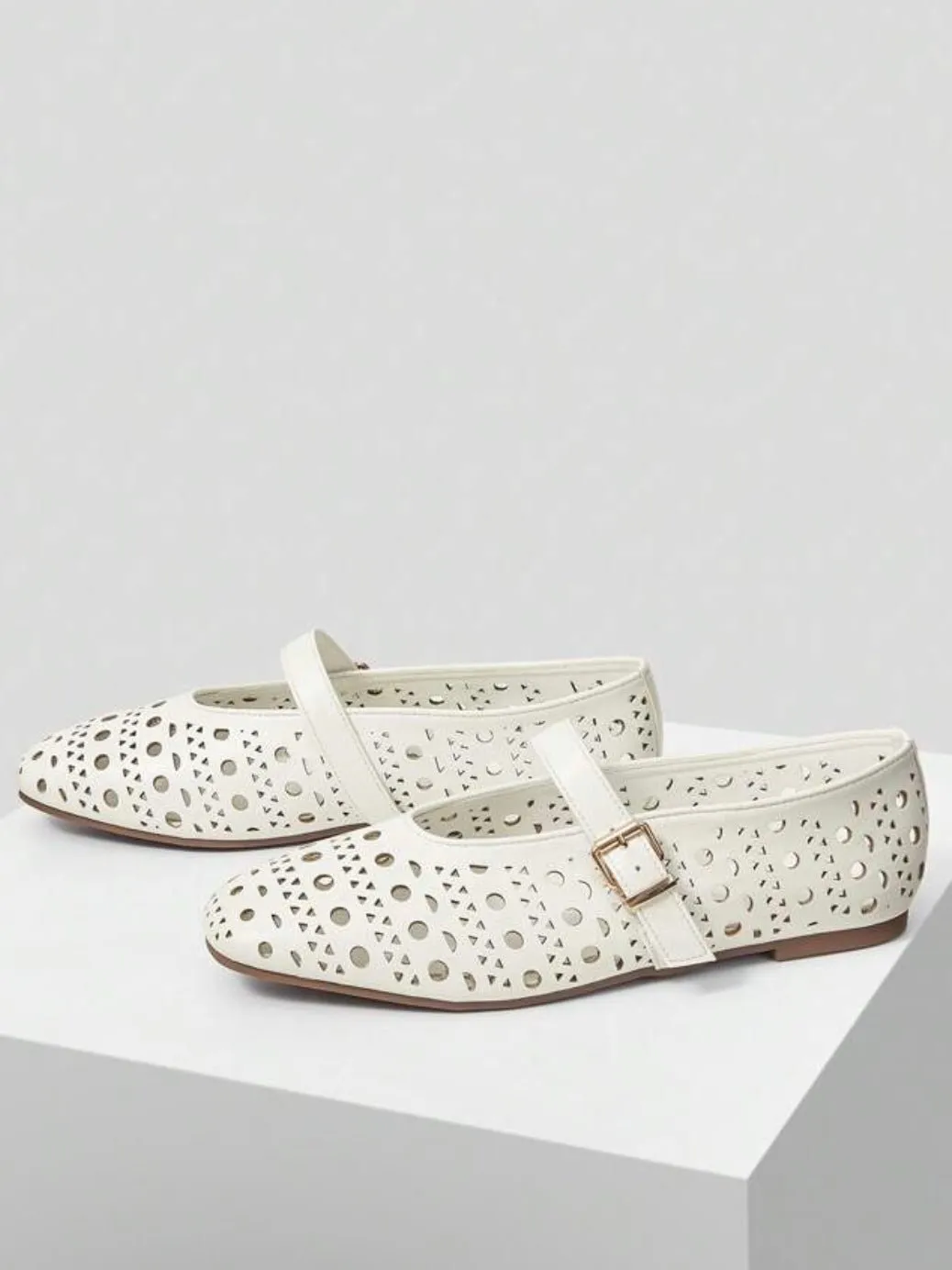 White cutout pattern flats shoes